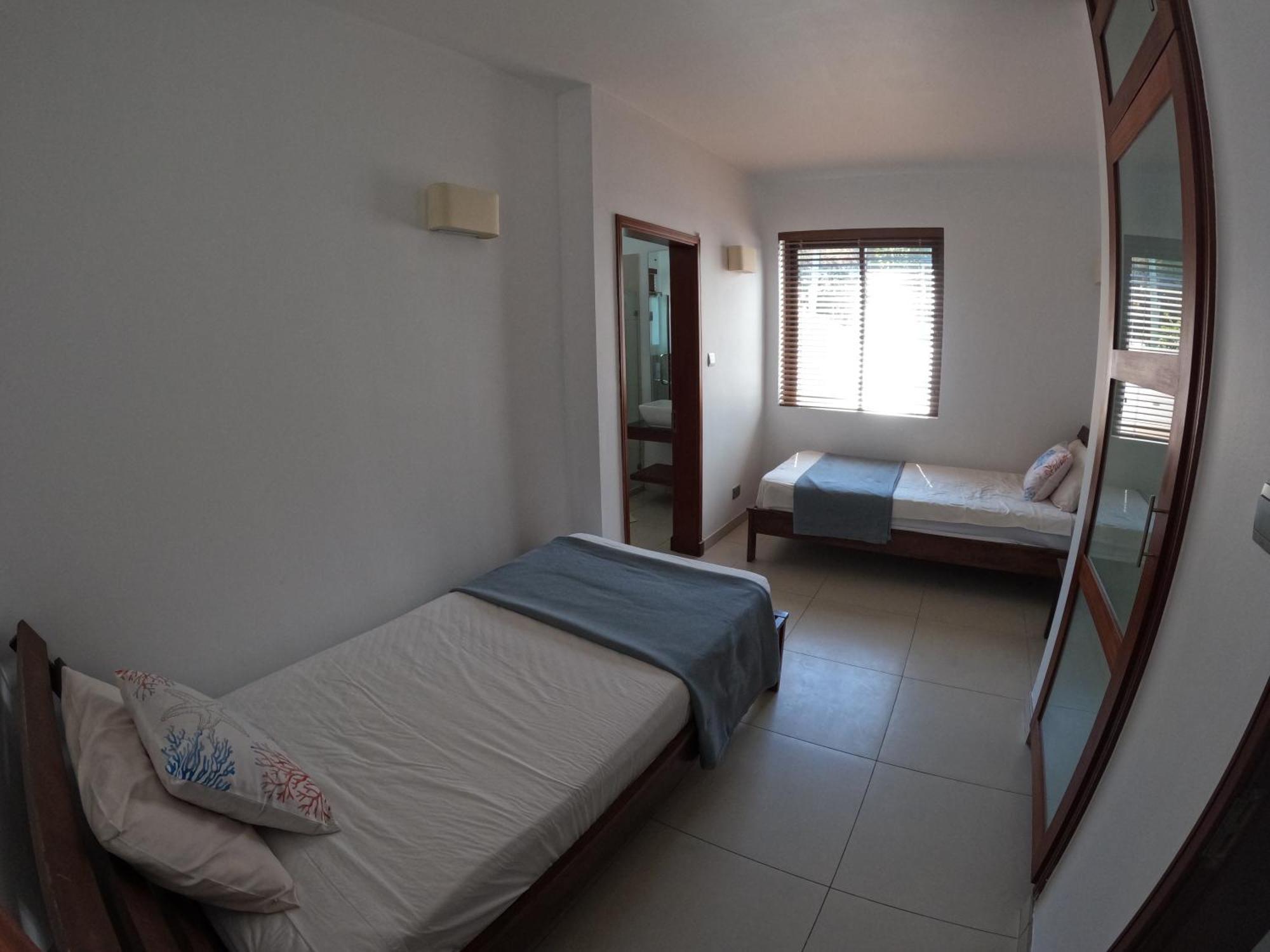 Olana Blue - Beachfront Apartment Rivière Noire Zewnętrze zdjęcie